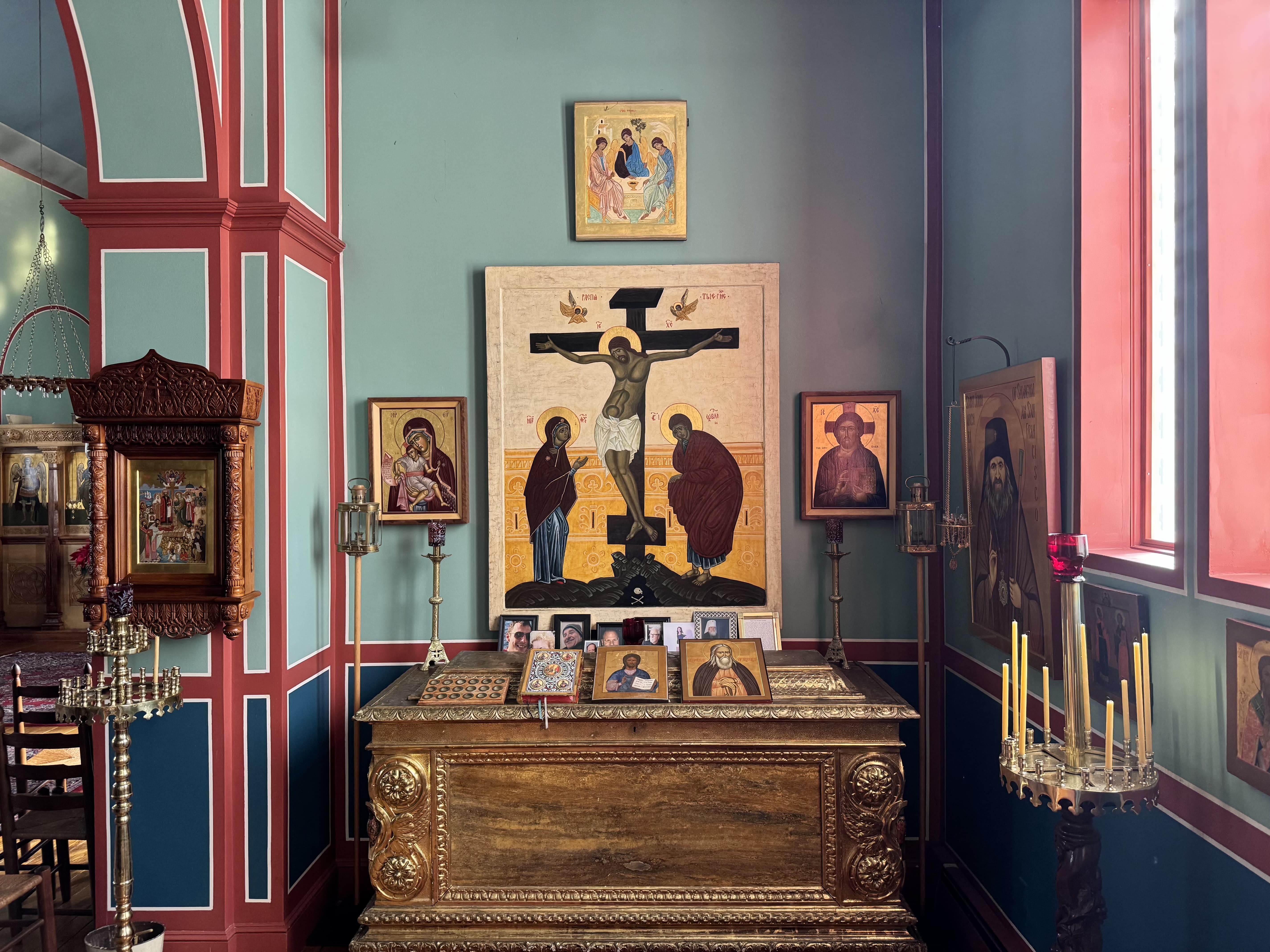 An icon of Christ on the Cross above the altar.