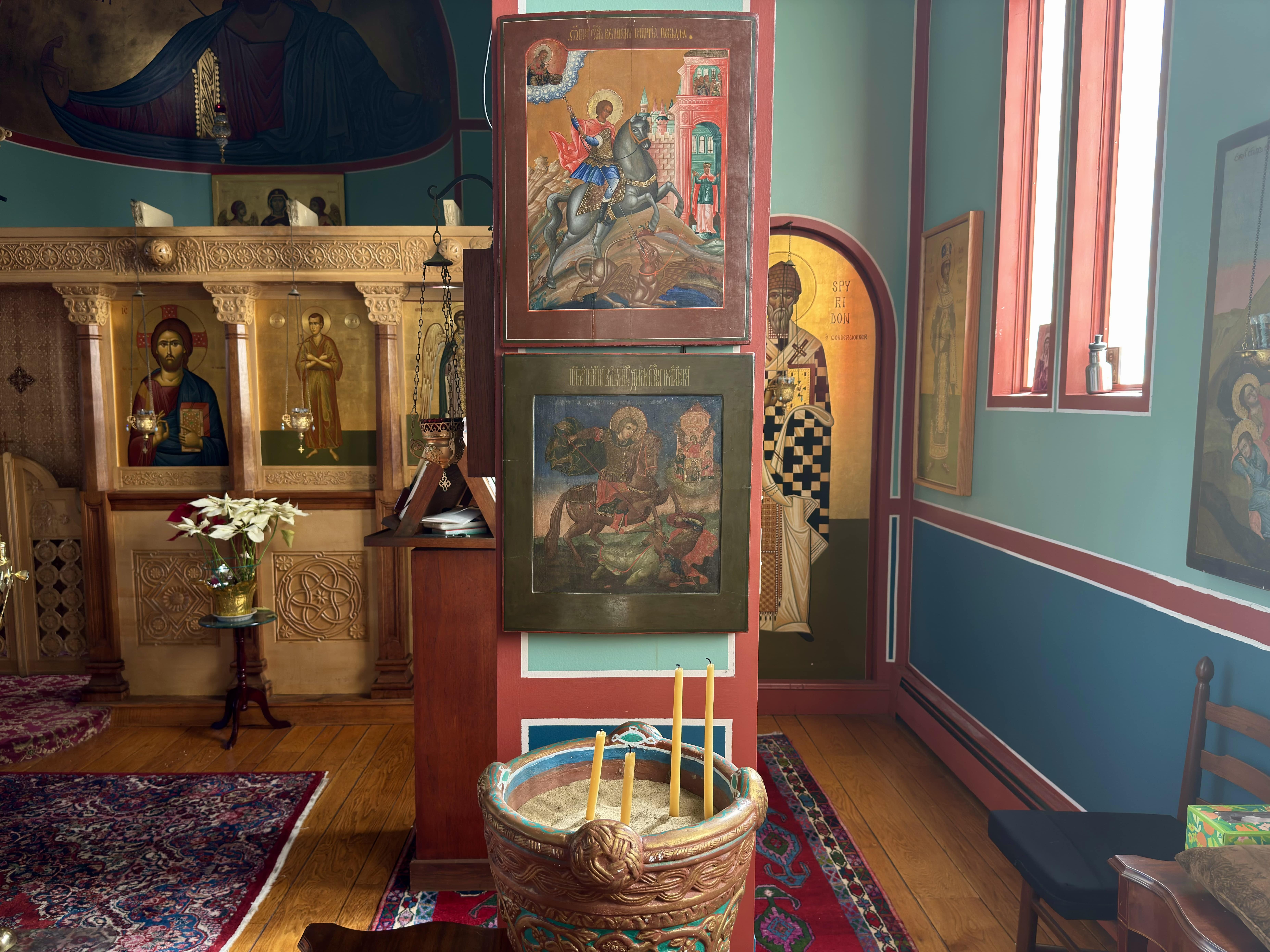 The 2 icons of St. George by the Reader's corner.