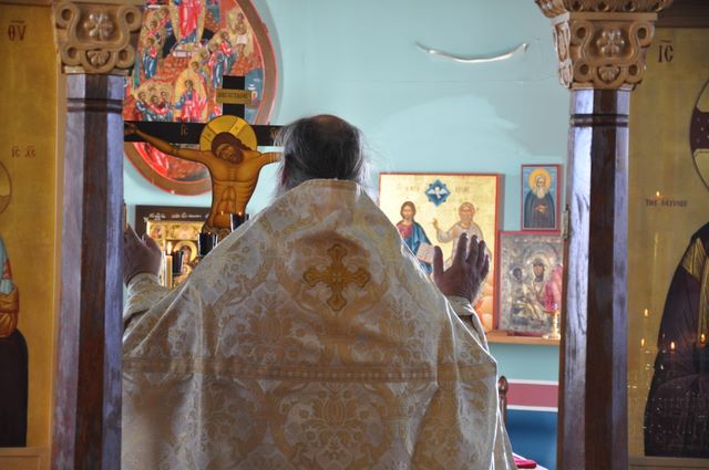 Fr. Spyridon in front of the altar