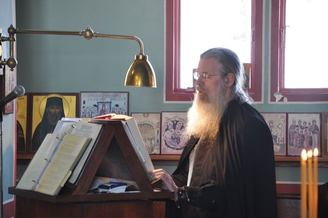 Fr. Herman reads in front of the Kursk Root icon