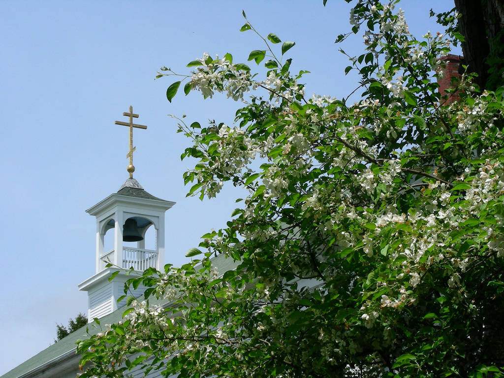 Cross at the top of the church during summer